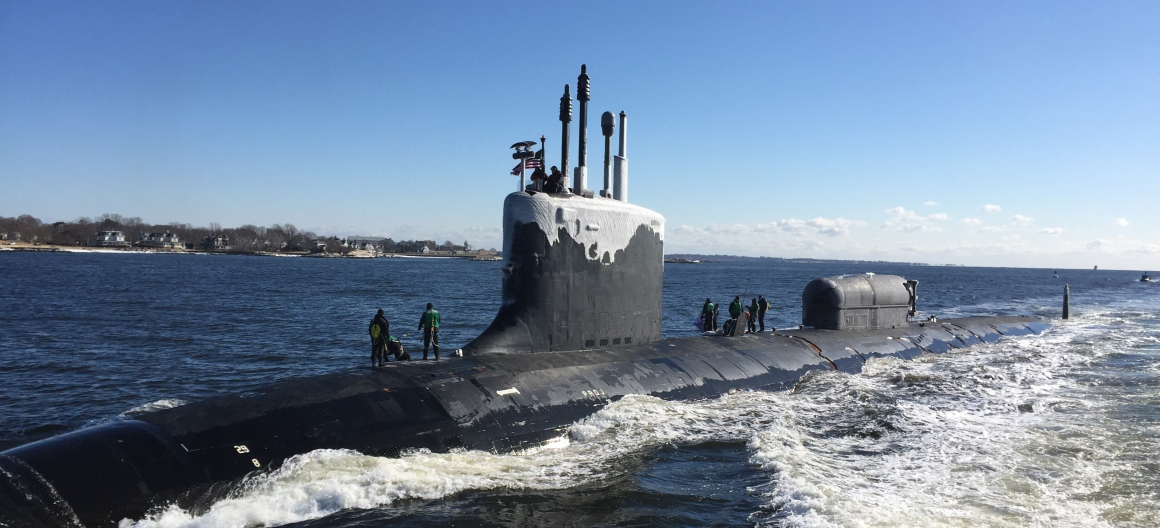 The Virginia-class, nuclear-powered, fast-attack submarine, USS North Dakota (SSN 784), transit the Thames River as they pull into their homeport on Naval Submarine Base New London in Groton, Conn. North Dakota is returning from the European Command Area of Responsibility where they executed the Chief of Naval Operation’s Maritime Strategy in supporting national security interests and Maritime Security Operations. (U.S. Navy photo by Cmdr. Jason M. Geddes)